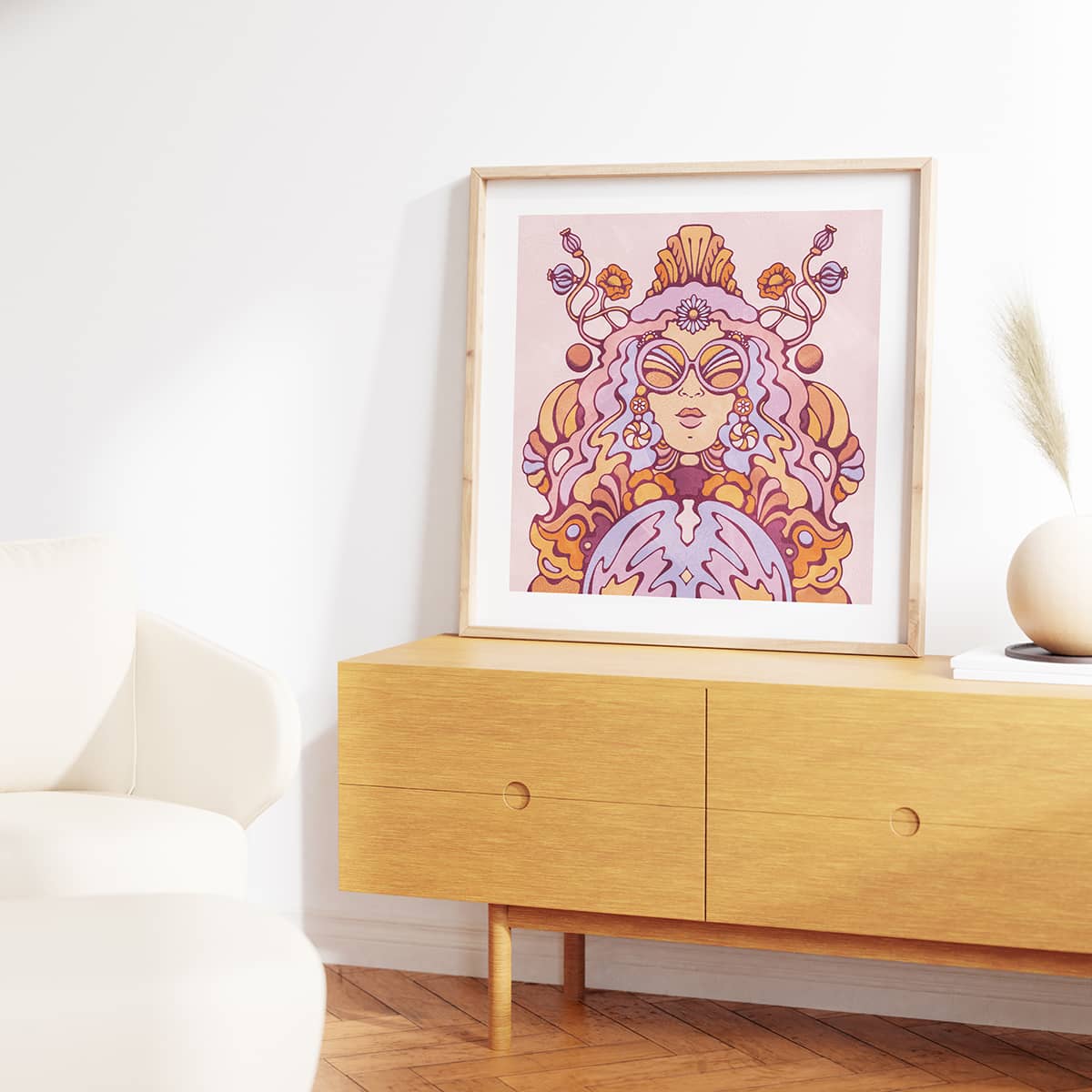 Vintage style purple and gold art print in wooden frame on a sideboard